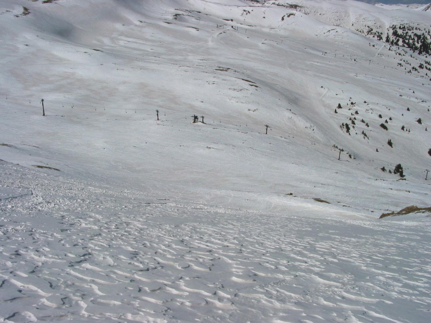 Looking down across the sastrugi of the Castle Rock Run at Chairlift 9 and the Four Headwall Area of Loveland.