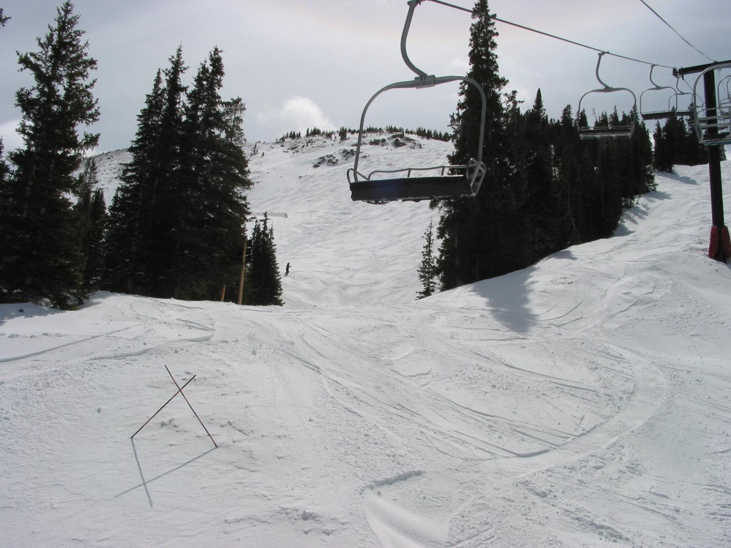 Avalanche Bowl From the Bottom, Looking Up From A Chair on Lift One, on April 13, 2009 at the Loveland Basin Ski Area.  Note the high clouds forming a halo around the sun at the top of the picture.